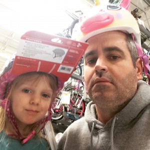 Dad and Laylah bike helmets Just keeping it real
